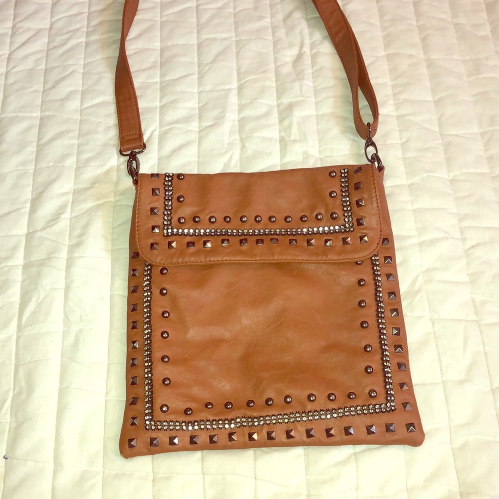 Studded leather purse.
